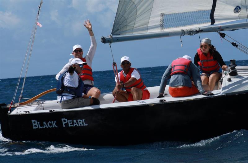 6th Annual USVI Hotel & Tourism Association Regatta - Team Pink Palm Hotel, L to R: Brent Pelton (far left, waving), STYC Coach Dennis Nixon (in front of Pelton), Jason Fleming, Louis Pierre Anderson-Morshead, Elisa James - photo © STSC / C Bareuther