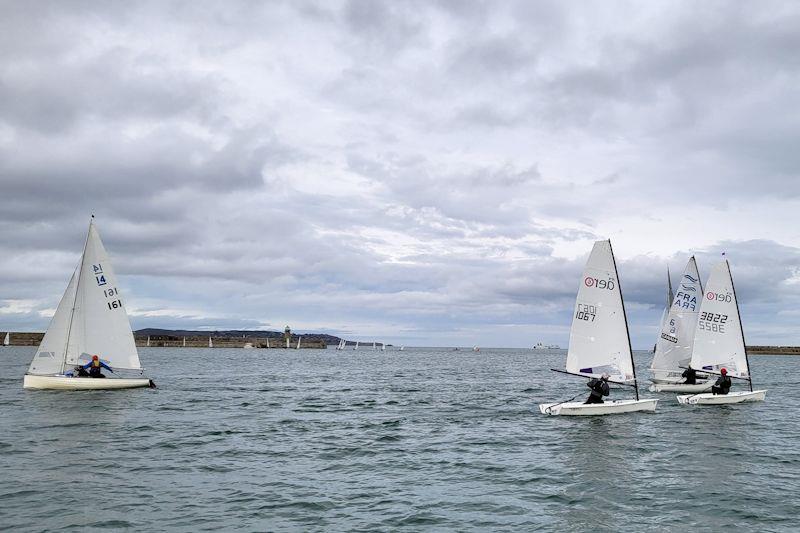 A flock of single-handers go down the top reach of the second race, Pierre & Remy Long (IDRA) approach the weather mark - Viking Marine DMYC Frostbite Series 2 day 11 - photo © Ian Cutliffe