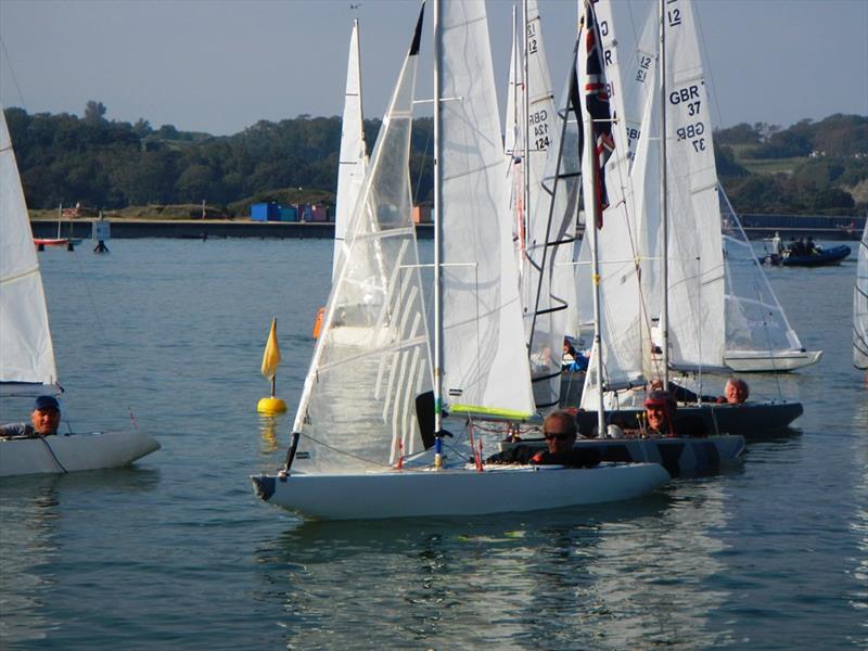 Race 3 finish during the Bembridge Illusion Picnic Hamper and Invitational photo copyright Mike Samuelson taken at Bembridge Sailing Club and featuring the Illusion class