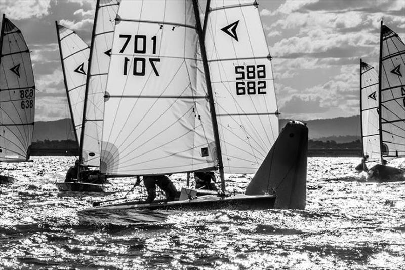 Andrew Turnbull-Miller leads the fleet - 2021 Queensland Impulse State Championship photo copyright Marina Hobbs taken at Humpybong Yacht Club and featuring the Impulse class