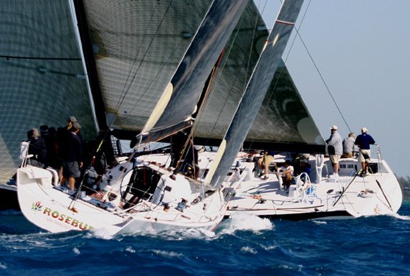 JJ Isler driving the TP52 Rosebud as the Farr 60 Numbers (part-Alinghi crew) crosses on day 4 at Key West 2005 photo copyright Rich Roberts taken at  and featuring the IMS class