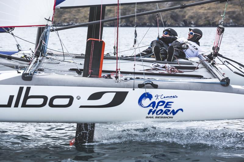 Franck Cammas rounds Cape Horn in a foiling catamaran - photo © Julbo