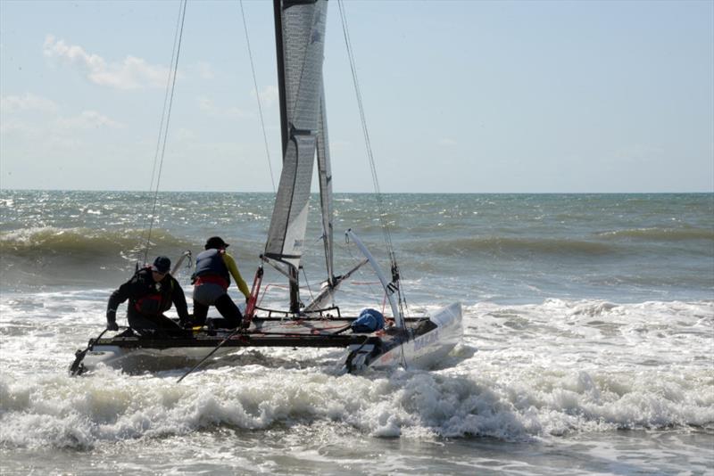 Team Australia in the CCB surf - photo © worrell1000race.com