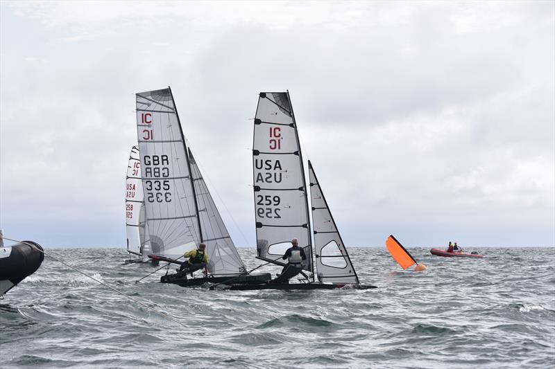 The moment the cup slipped away from the USA? Chris Maas (USA)  tries to squeeze Gareth Caldwell (GBR) but lacked the speed to make it stick photo copyright David Henshall taken at Plas Heli Welsh National Sailing Academy and featuring the International Canoe class