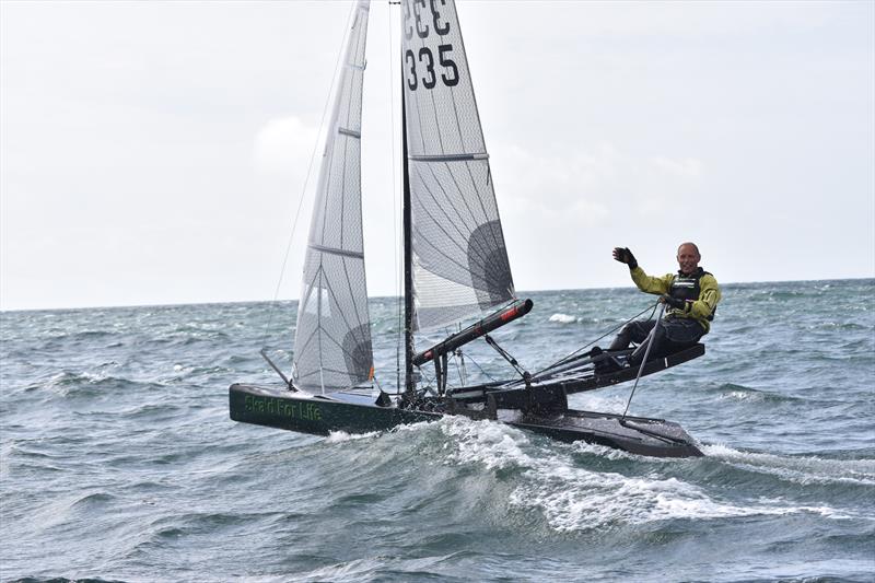 A jubilant Gareth Caldwell celebrates after another storming performance means that the Cup is returning to the UK - photo © David Henshall