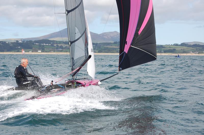 AC in a hurry - the leading boat can be seen inverted out ahead on day 5 of the International Canoe Worlds at Pwllheli - photo © David Henshall