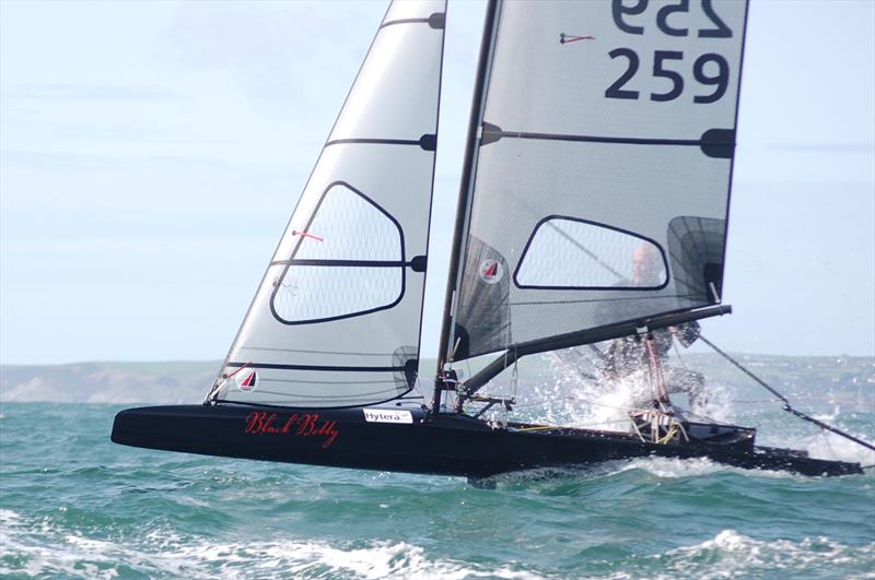 When the going gets tough, the tough get going. Needing a win, Chris Maas is getting the hammer down on day 5 of the International Canoe Worlds at Pwllheli photo copyright David Henshall taken at Plas Heli Welsh National Sailing Academy and featuring the International Canoe class