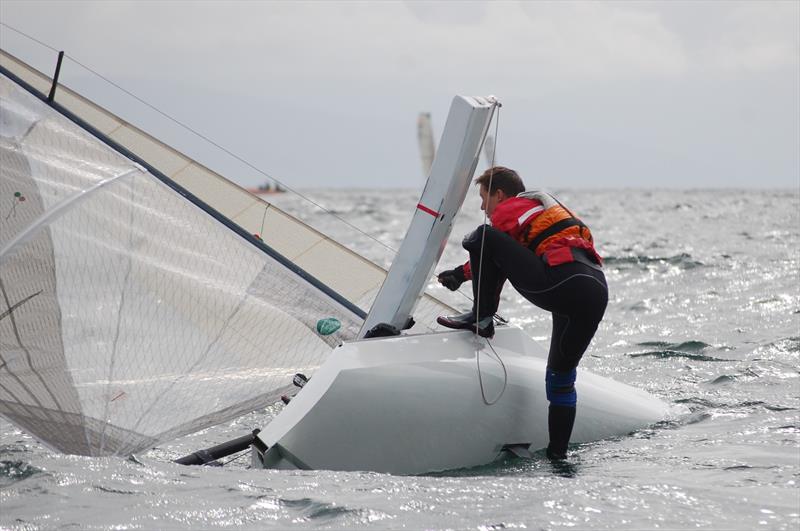 Even before the start the canoes were capsizing in number, with the sea state making recovery difficult on day 6 of the International Canoe Worlds at Pwllheli photo copyright David Henshall taken at Plas Heli Welsh National Sailing Academy and featuring the International Canoe class