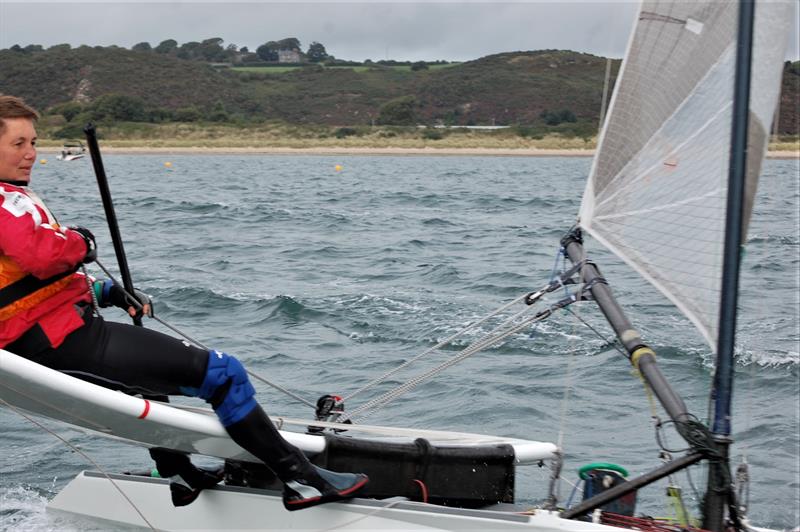 As in many of the other properly international fleets, the Germans are increasingly powerful. In the Canoes they provide youth, lady helms (as seen here) and some very fast front runners photo copyright David Henshall taken at Plas Heli Welsh National Sailing Academy and featuring the International Canoe class