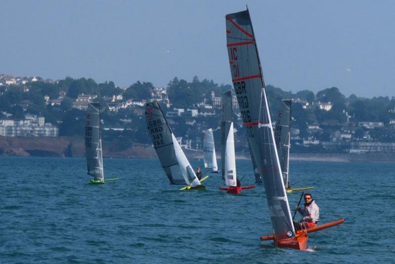 Alisdair Alston leads the pack downwind - International Canoe Europa Cup and British National Championships at Brixham photo copyright Michaela Warren taken at Brixham Yacht Club and featuring the International Canoe class