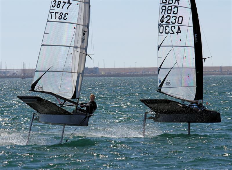 3877 and 4230 on day 3 of the VRsport.tv International Moth UK Nationals in Weymouth photo copyright Mark Jardine / IMCA UK taken at Weymouth & Portland Sailing Academy and featuring the International Moth class