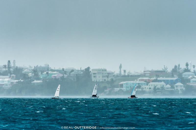 A squall tears across Great Sound as Germany's Philip Buhl (left), Italy's Francesco Bruni and Brooks Reed of the U.S. sail upwind on day 1 of the Bacardi Bermuda Moth National Championship - photo © Beau Outteridge / www.beauoutteridge.com