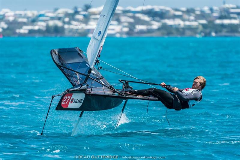 Bermuda's Benn Smith, the youngest sailor in the Bacardi Bermuda Moth National Championship, works his boat on Great Sou photo copyright Beau Outteridge / www.beauoutteridge.com taken at Royal Bermuda Yacht Club and featuring the International Moth class