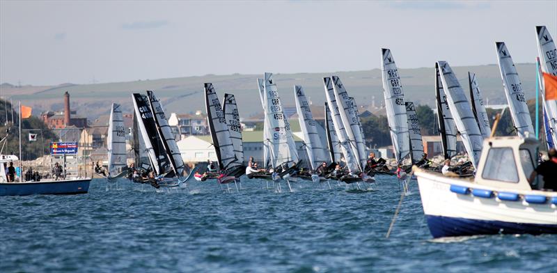 Close racing on the final day of the 2019 Wetsuit Outlet UK Moth Nationals at Castle Cove SC photo copyright Mark Jardine / IMCA UK taken at Castle Cove Sailing Club and featuring the International Moth class