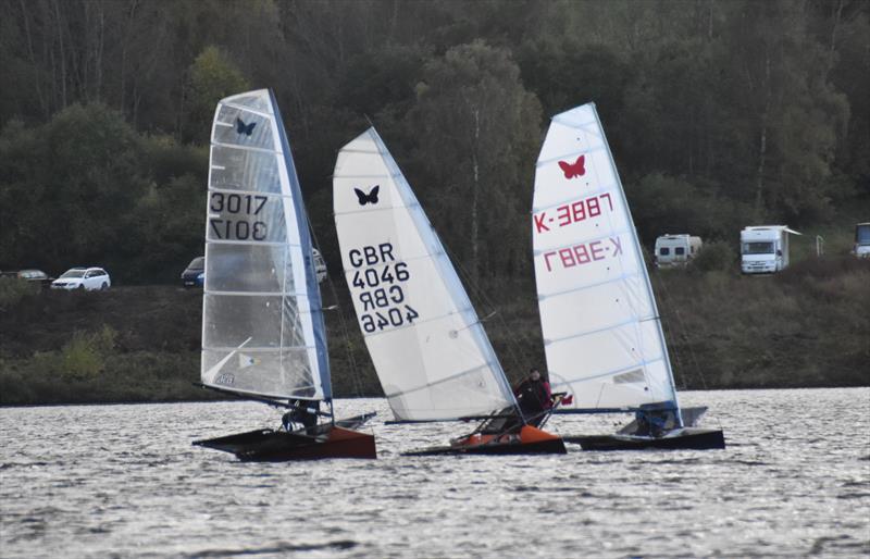 Lowrider International Moth Nationals at Burton: Hungry Tigers chasing Magnum 6 photo copyright Kevin Hope taken at Burton Sailing Club and featuring the International Moth class