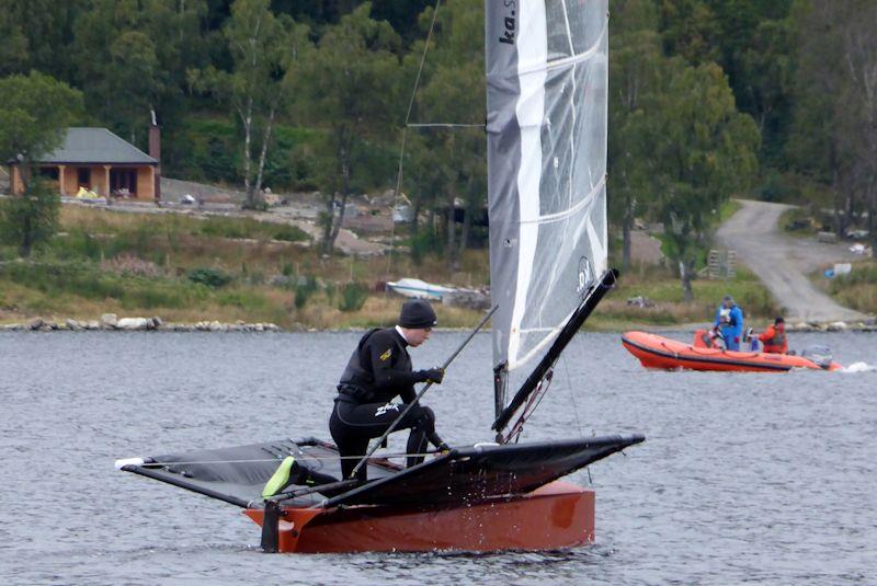 George Edwards demonstrates the Hungry Tiger yoga move - International Moth Lowriders Scottish Championships at Loch Tummel photo copyright Ian Baillie taken at Loch Tummel Sailing Club and featuring the International Moth class