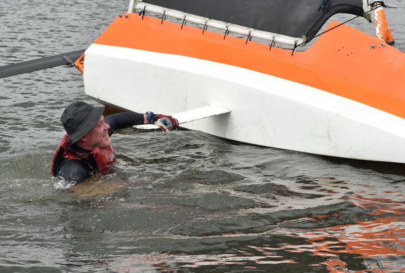 Sam Barker clears his hangover - Lowrider Moths at Nantwich & Border Counties SC photo copyright Dougal Henshall taken at Nantwich & Border Counties Sailing Club and featuring the International Moth class