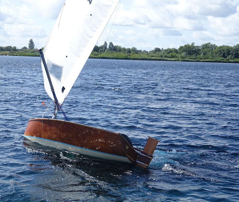 A mystery Mistral sailor photo copyright John Butler taken at Burton Sailing Club and featuring the International Moth class