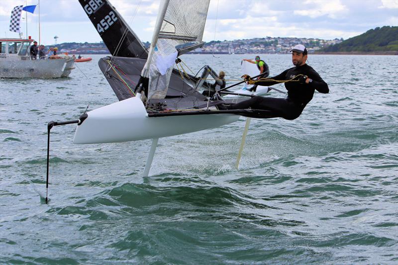 Dan Holman on Day 1 of the Wetsuit Outlet International Moth UK Nationals photo copyright Mark Jardine / IMCAUK taken at Restronguet Sailing Club and featuring the International Moth class