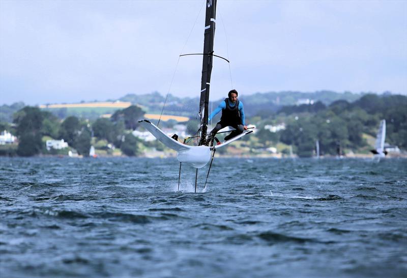 Joe Adams on Day 2 of the Wetsuit Outlet International Moth UK Nationals photo copyright Mark Jardine / IMCAUK taken at Restronguet Sailing Club and featuring the International Moth class