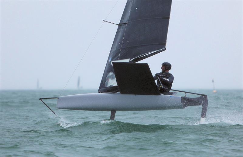 GBR 5249 Kyle Stoneham in Race 10 as the rain gets heavier on Wetsuit Outlet International Moth UK Championship Day 4 photo copyright Mark Jardine taken at Royal Torbay Yacht Club and featuring the International Moth class