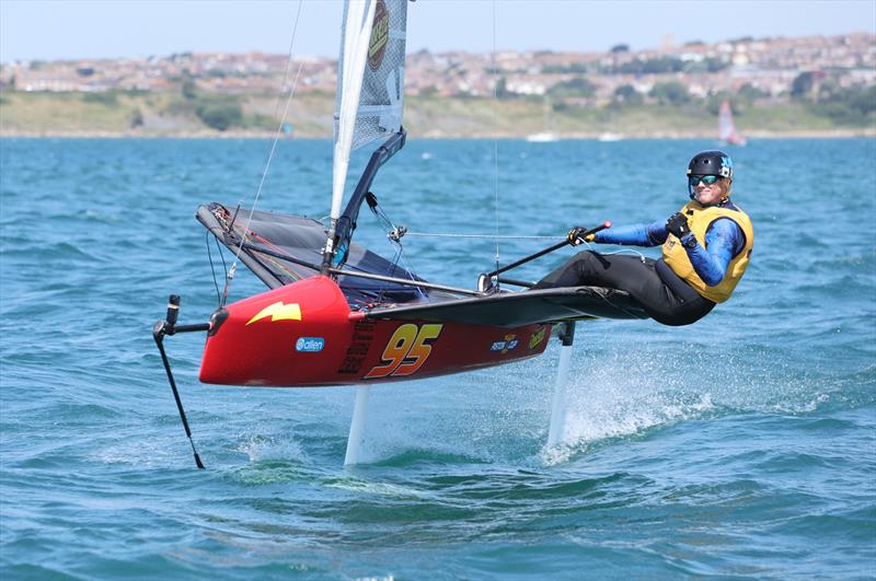 Wetsuit Outlet International Moth UK Nationals at the WPNSA Day 4 - GBR 4385 Grant Blake finishes Race 9 photo copyright Mark Jardine taken at Weymouth & Portland National Sailing Academy and featuring the International Moth class