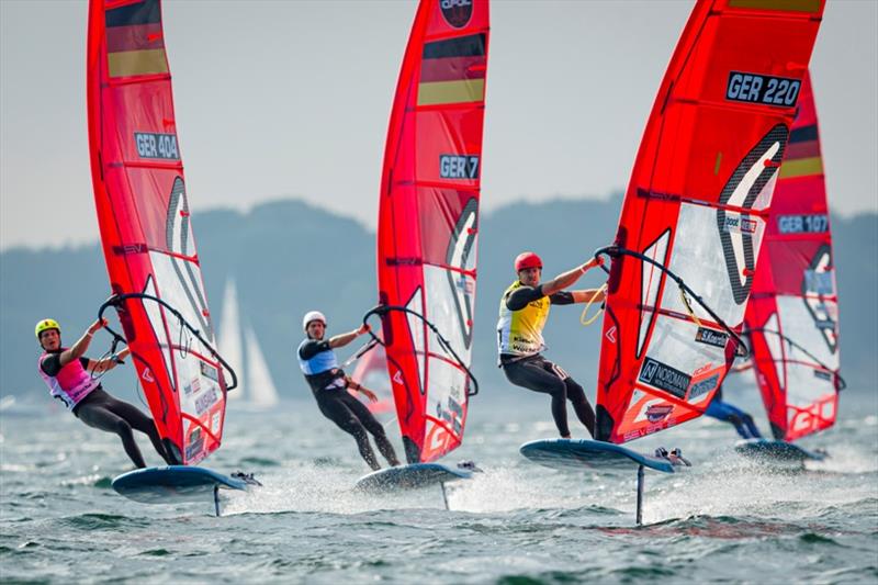 Sebastian Kördel in front ahead of Nicolas Prien (centre) and Fabian Wolf - that's the standings in the intermediate classification of the iQFoilers at Kieler Woche 2021. - photo © Sascha Klahn