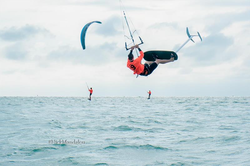 A jump at the Race Committee Boat by Competitor Zack Marks photo copyright Nick Mandalou taken at St. Petersburg Yacht Club, Florida and featuring the iQFoil class