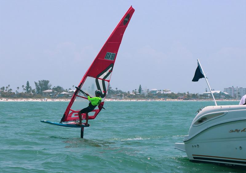 Justin Ahearn finishes a race - photo © Britt Viehman