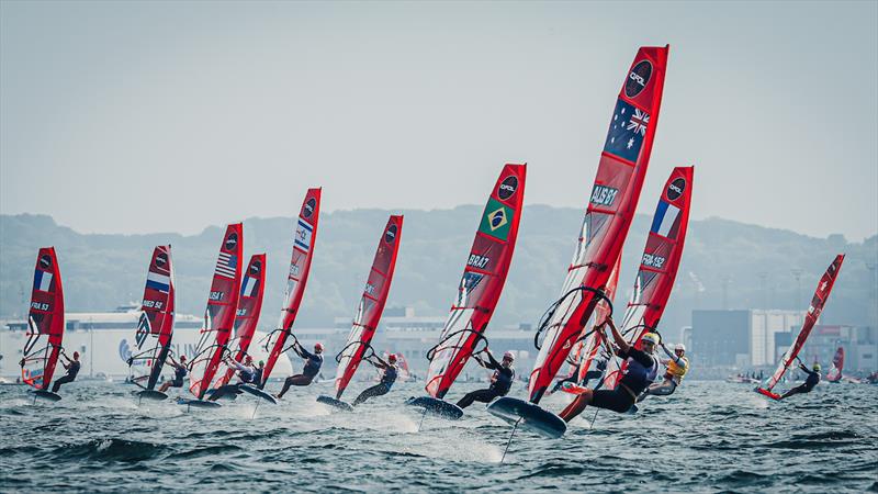 Grae Morris leads the fleet during the iQfoil Worlds at Aarhus, Denmark photo copyright Sailing Energy / iQfoil Class taken at Sailing Aarhus and featuring the iQFoil class