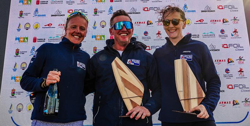 iQFOiL athletes Emma Wilson (left) and Islay Watson (right) with coach Sam Ross - photo © Sailing Energy / iQfoil Class