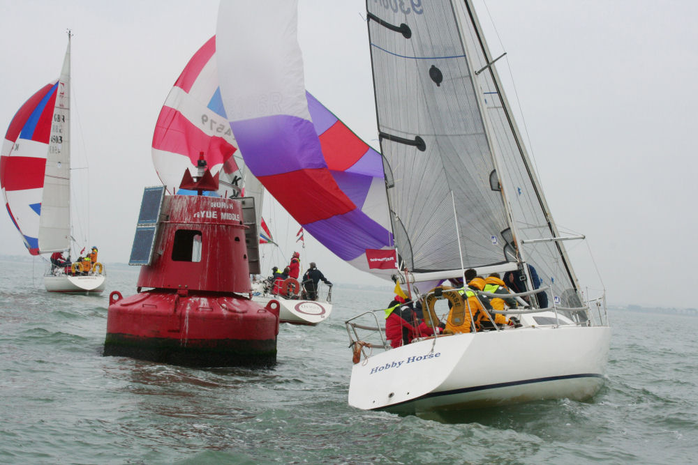 Michael Fawcett's Mustang 30 Hobby Horse chases the Sigma 33s in IRC 5 during week 6 of the Raymarine Warsash Spring Series photo copyright Eddie Mays taken at Warsash Sailing Club and featuring the IRC class