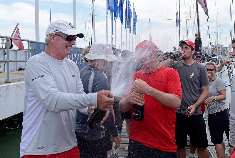 Captain of the three-boat squad, Anthony O'Leary celebrates dockside today with Marc Glimcher, Catapult as Ireland win the Brewin Dolphin Commodores' Cup photo copyright Rick Tomlinson / RORC taken at Royal Ocean Racing Club and featuring the IRC class