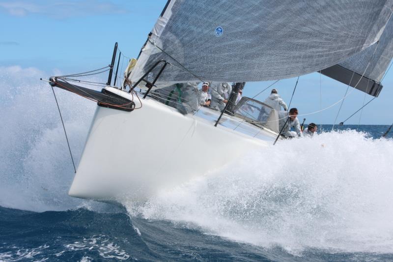 Larry Landry & Paul McDowell's Farr 60, Prospector (USA) crashes through the waves during the 2015 RORC Caribbean 600 photo copyright Tim Wright / www.photoaction.com taken at Antigua Yacht Club and featuring the IRC class