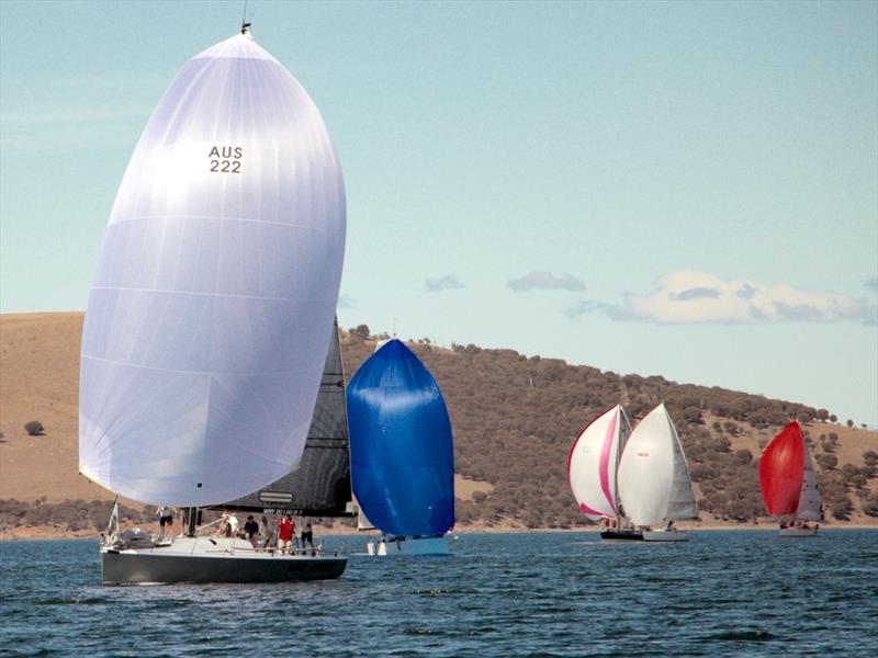 The Farr 40 War Games lead X&Y on a spinnaker run for Division A on the Derwent during the Hobart Combined Clubs Harbour Series photo copyright Angus Calvert taken at  and featuring the IRC class