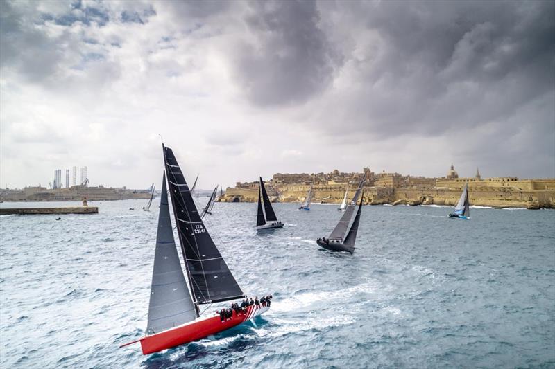 Freccia Rossa after the Rolex Middle Sea Race 2018 start photo copyright Rolex / Kurt Arrigo taken at Royal Malta Yacht Club and featuring the IRC class