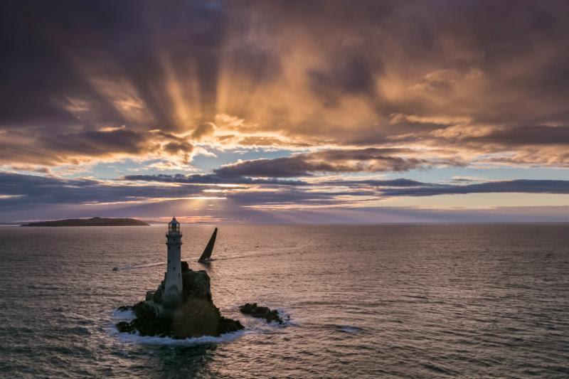 Nikata passes the Fastnet Rock at sunrise in the 2017 edition of the race photo copyright Rolex / Carlo Borlenghi taken at Royal Ocean Racing Club and featuring the IRC class