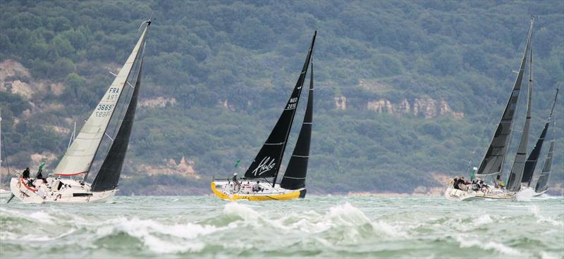 The 2019 Rolex Fastnet Race fleet pass Hurst Casle - photo © Mark Jardine