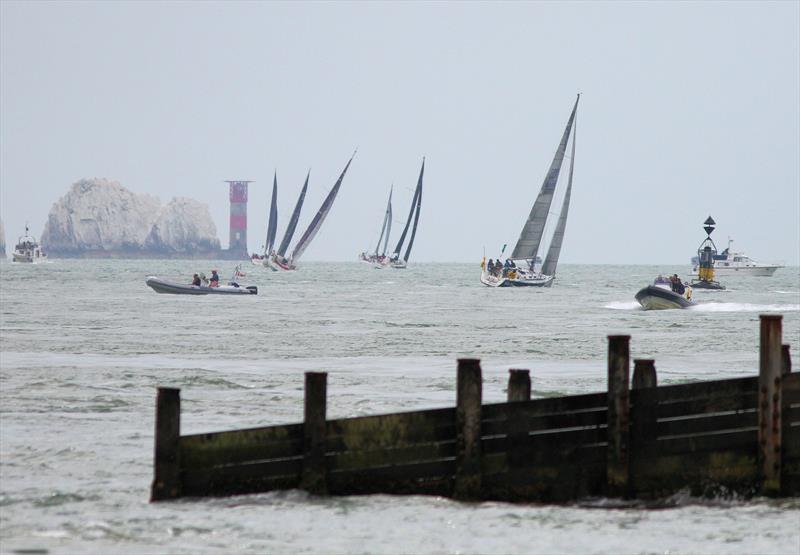 The 2019 Rolex Fastnet Race fleet pass Hurst Casle photo copyright Mark Jardine taken at Royal Ocean Racing Club and featuring the IRC class