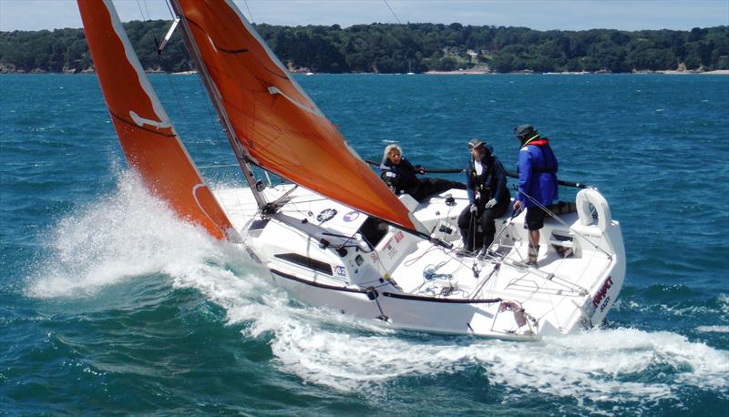 Crumpet finishing race 1 of the Jackson Yacht Services Bay Races at RCIYC photo copyright Bill Harris taken at Royal Channel Islands Yacht Club and featuring the IRC class