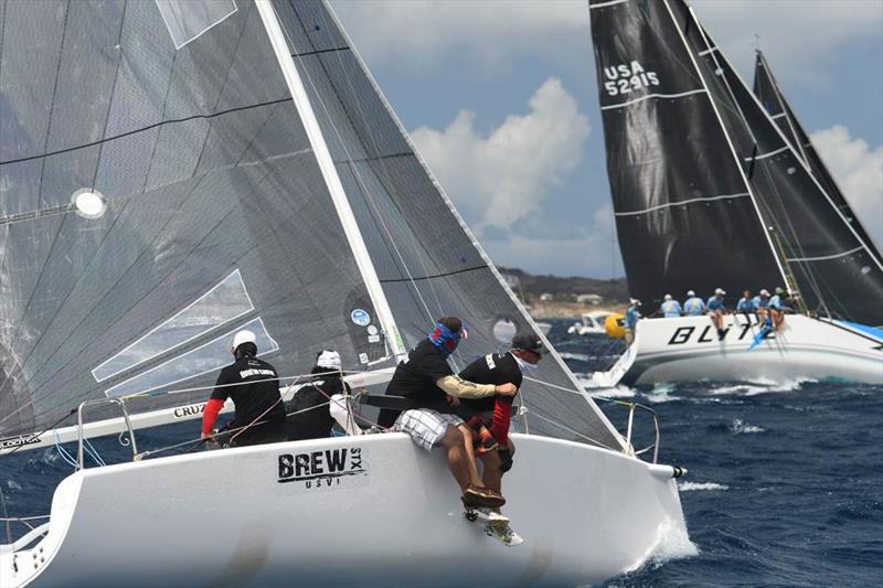 2021 St. Thomas International Regatta Day 1: St. Croix's Chris Stanton on Brew STX Crew (left) and St. Thomas' Peter Corr's Blitz (right) race in the CSA Spinnaker Racing Class photo copyright Dean Barnes taken at St. Thomas Yacht Club and featuring the IRC class