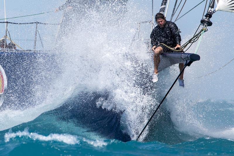 The bowman aboard Peter Harburg’s supermaxi, Black Jack, enjoys a wet ride at Hamilton Island Race Week 2017  - photo © Andrea Francolini