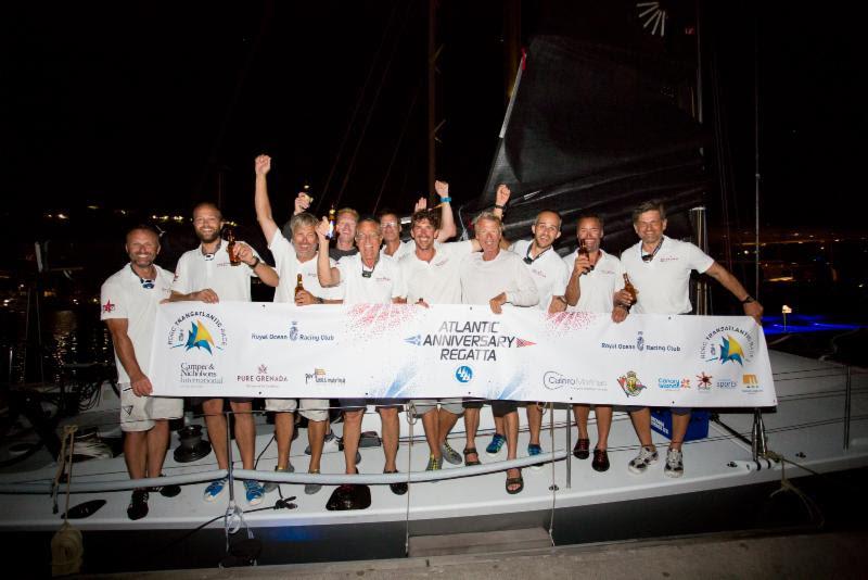 A happy crew on Tilmar Hansen's Elliott 52 Outsider after finishing the 3,000 mile competitive race in Grenada after  13 days 13 hrs 47 mins 21secs photo copyright RORC / Arthur Daniel taken at Royal Ocean Racing Club and featuring the IRC class