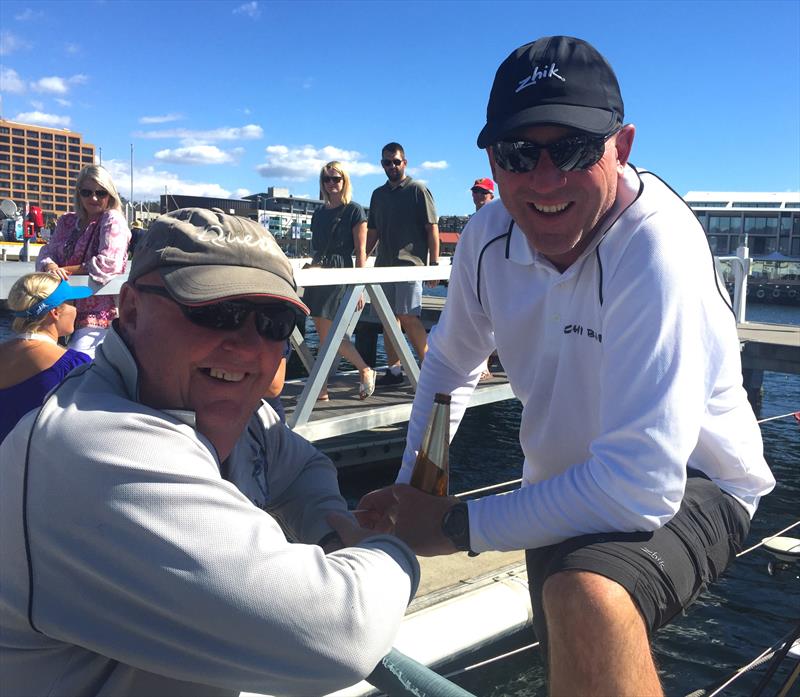 Matt Allen talks with Michael 'Greenie' Green of Quest (Sailing Master) photo copyright Crosbie Lorimer taken at Cruising Yacht Club of Australia and featuring the IRC class