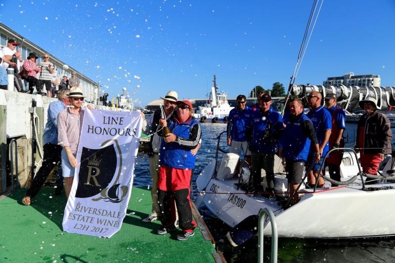 Skipper Gary Smith leads the celebrations after taking line honours with The Fork in the Road photo copyright Shaun Tiedemann taken at  and featuring the IRC class