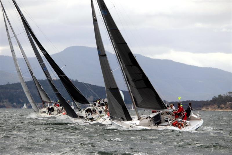 Racing division boats beating to windward in a strong nor'wester on the River Derwent - 2018 Crown Series Bellerive Regatta - photo © Peter Watson