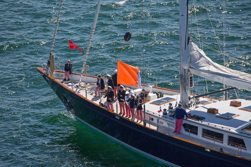 Race officials observe from one end of the starting line (orange flag). - photo © Billy Black