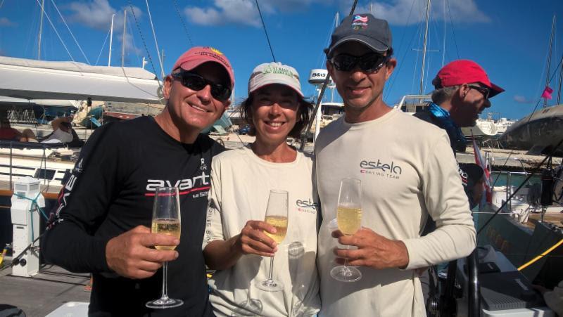 Jeremi Jablonski, owner/skipper of Hanse 43 Avanti with Estela and Luigi Miranda, owners of GS52LC Estela from Puerto Rico celebrating Avanti's win today and Estela Miranda's birthday - 2018 BVI Spring Regatta - photo © Event Press