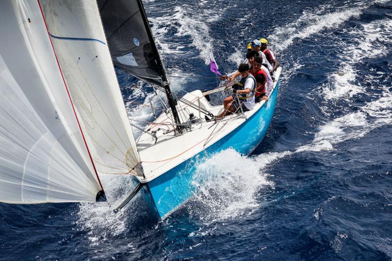 Enjoying warm water racing, London's Greig City Academy youth sailors take to the water on day three of Antigua Sailing Week and achieved a podium position - photo © Paul Wyeth