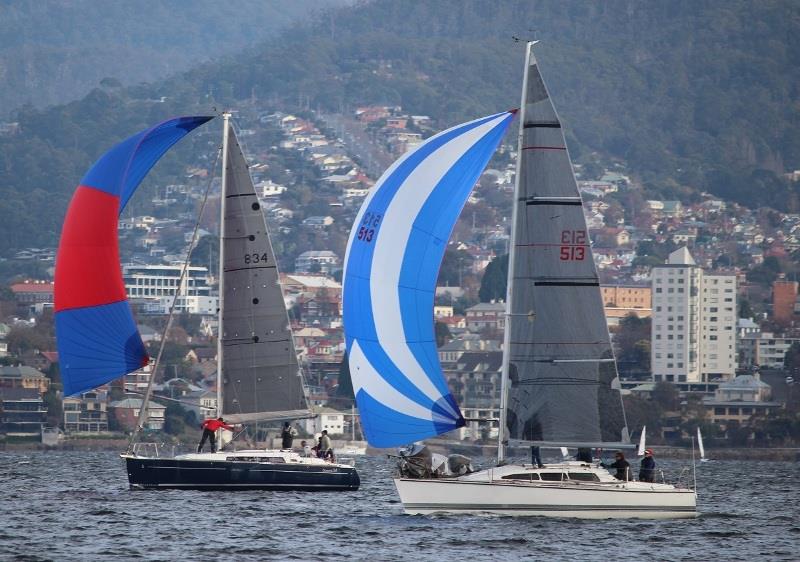 Off-Piste and Saga running down the Derwent photo copyright Peter Watson taken at Bellerive Yacht Club and featuring the IRC class